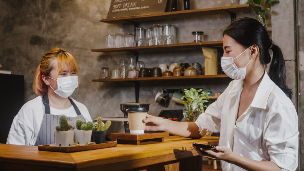 Young Asia Female Barista Wear Face Mask Serving T 2G6Jh3Z 1 - 5 Signs Your Company Needs A Digital Transformation
